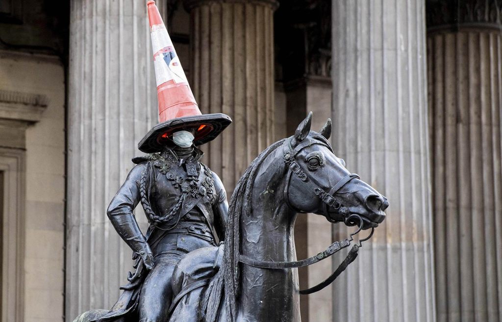 Famous Glasgow statue of the Duke of Wellington  - with the now permanent traffic cone on its head.
