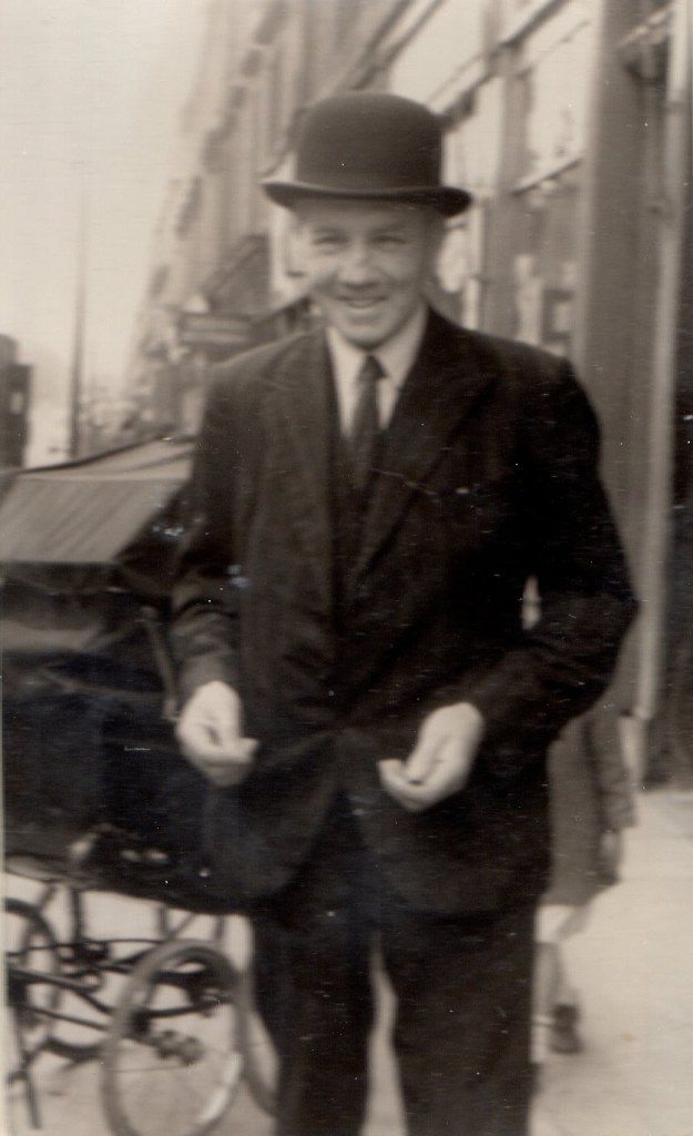 The author's Grandfather - photo from the early Sixties . Grandpa wearin suit and bowler hat.