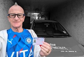 Author with his driving licence - eight months after having to forfeit it on medical grounds.